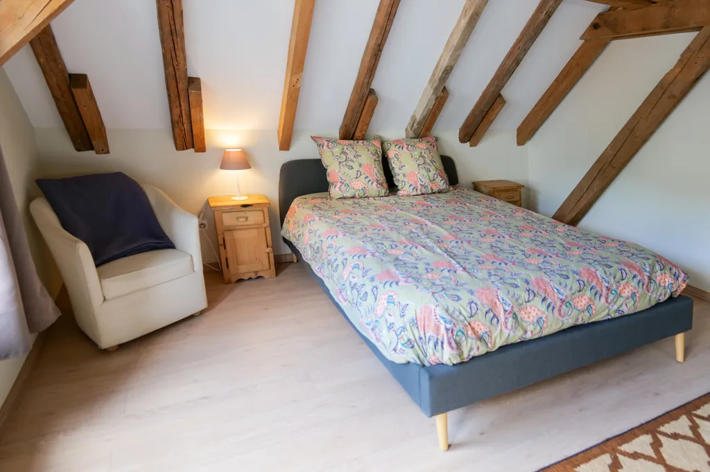 Holiday cottage with bath in Alsace for four people, in natural grounds beside the river